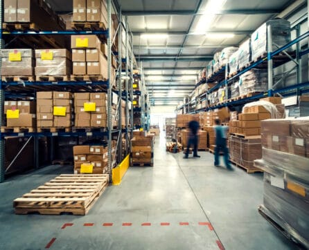 Warehouse,Interior,With,Shelves,,Pallets,And,Boxes